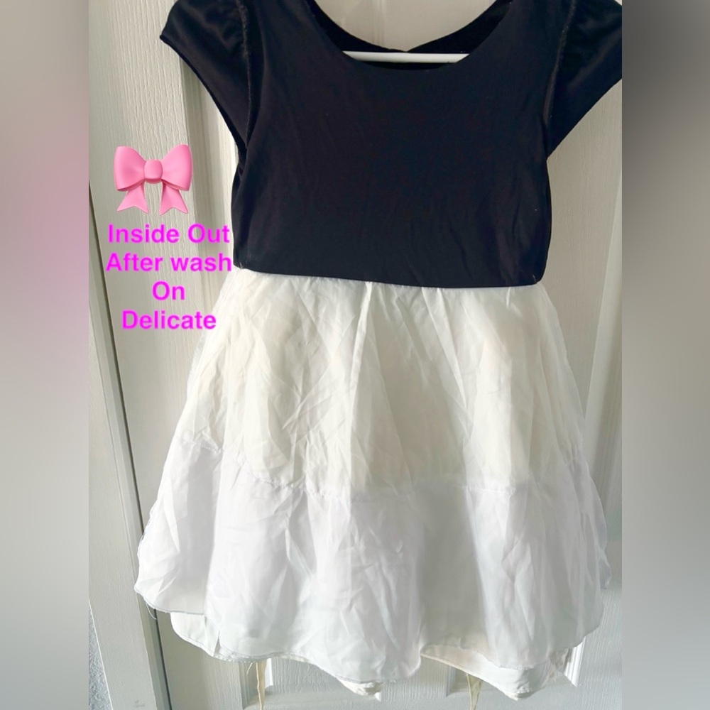 Jona Michelle Black, Ivory & Gold Dress with Bow Accent
Size: (7) - Picture 6 of 13